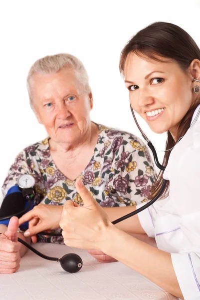 Pielęgniarka i babcia — Zdjęcie stockowe