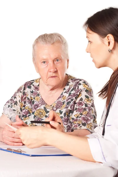 Nurse and granny chatting — Stock Photo, Image