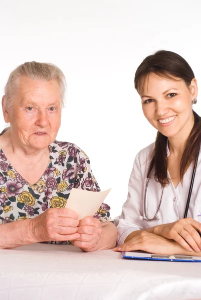 Enfermeira com paciente idoso — Fotografia de Stock