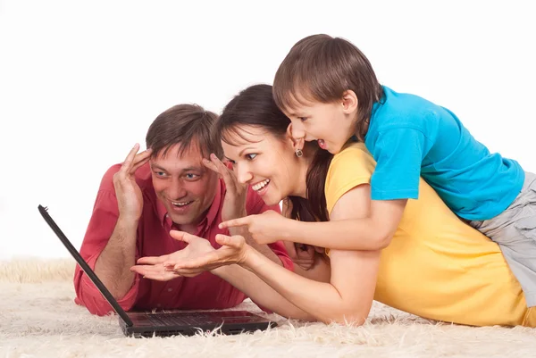 Family with laptop — Stock Photo, Image