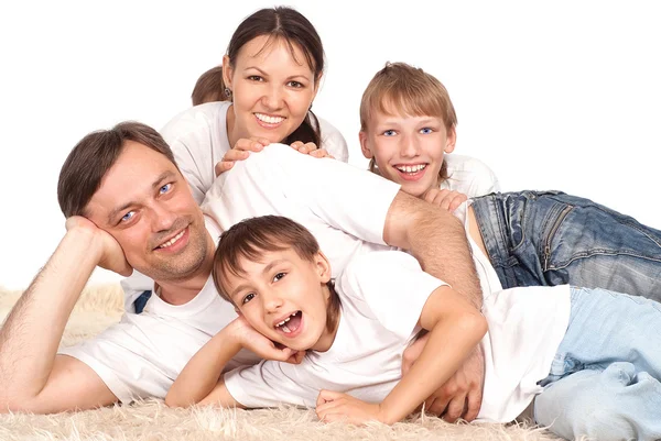 Family on carpet — Stock Photo, Image