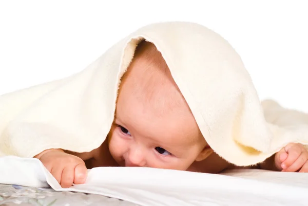 Baby under the towel — Stock Photo, Image