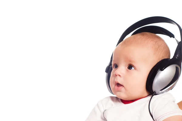 Bebé con auriculares —  Fotos de Stock