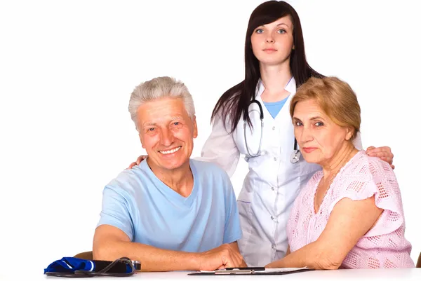 Pielęgniarka i rodziny uśmiechający się — Zdjęcie stockowe