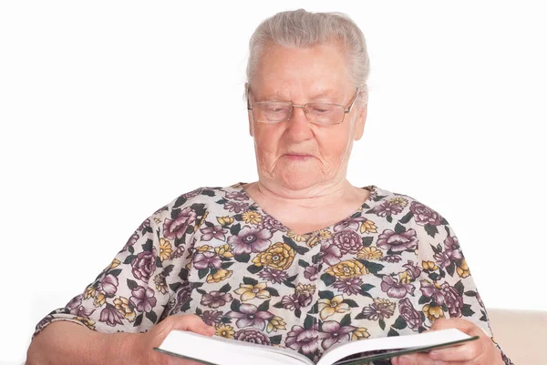 Oma mit Buch — Stockfoto