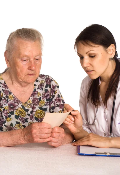 Доктор с бабушкой — стоковое фото