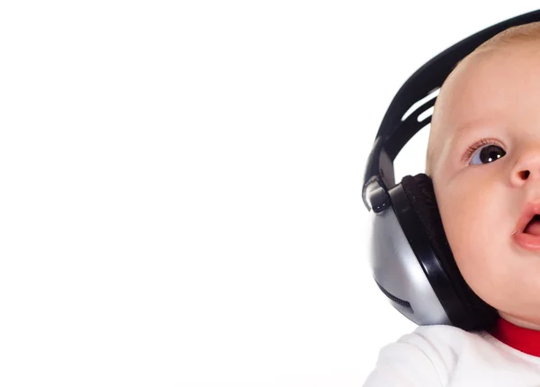 Baby and headphones — Stock Photo, Image