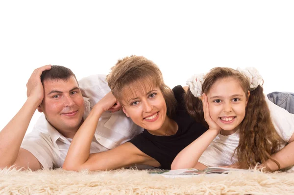 Roztomilá rodina ležící — Stock fotografie