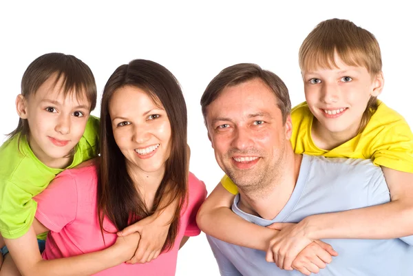 Lycklig familj på en vit — Stockfoto