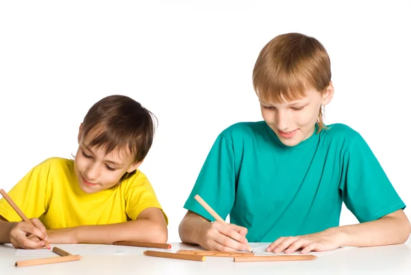 Two brothers drawing Stock Picture