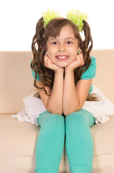 Little girl at sofa — Stock Photo, Image