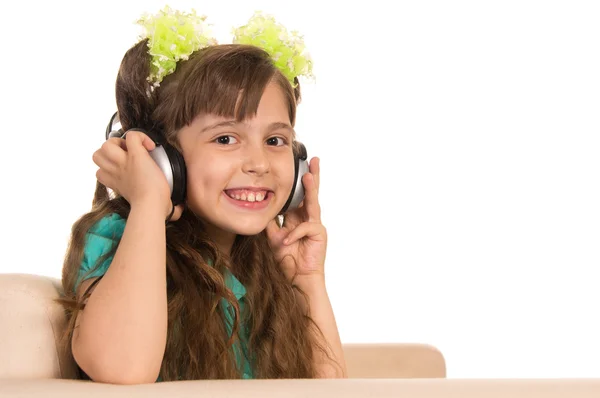 Little girl and headphones — Stock Photo, Image