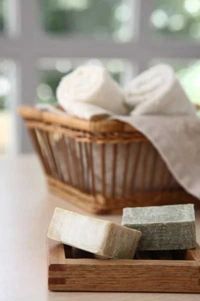 Soaps and natural basket — Stock Photo, Image