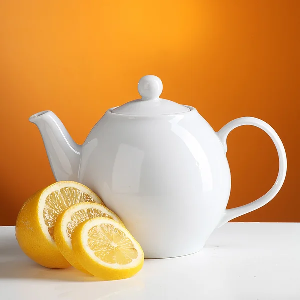 stock image Cup of tea with teapot