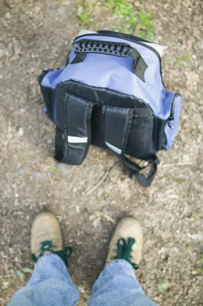 Hiker standing next to backpack on trail, concept photography — Stock Photo, Image