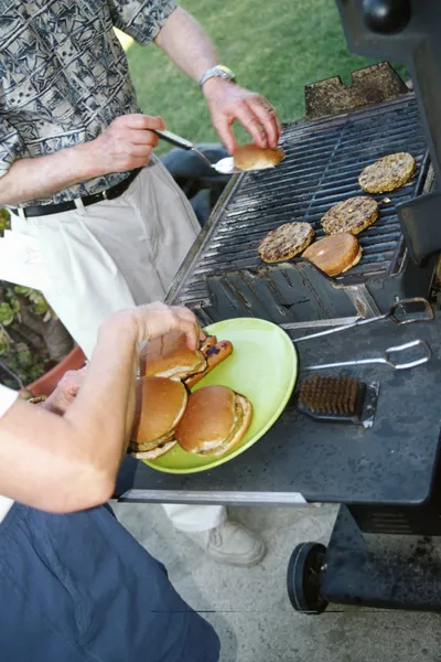 stock image Couple barbecueing