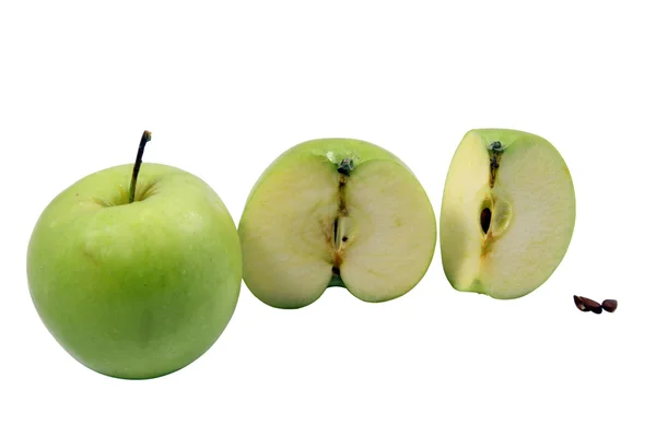 Drie groene appels en zaden — Stockfoto