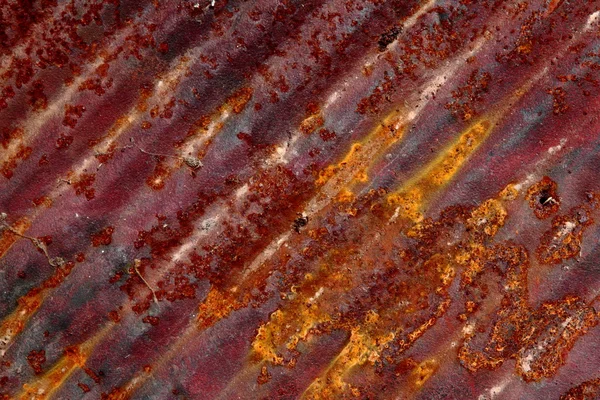Rust pattern at angle on corrugated metal sheet — Stock Photo, Image