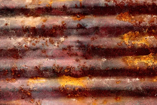 Rust pattern on corrugated metal sheet — Stock Photo, Image