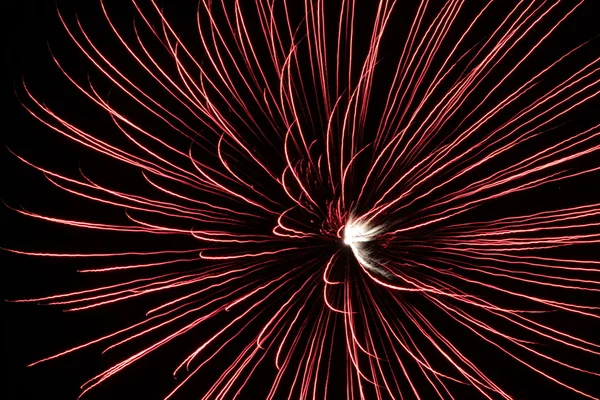 Single large red starburst fireworks — Stock Photo, Image