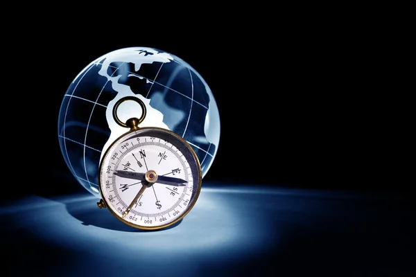 Världen och kompass — Stockfoto