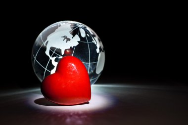 Globe and red heart clipart