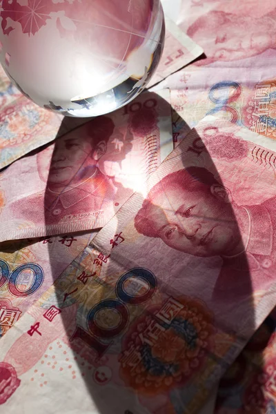 Globe en yuan — Stockfoto