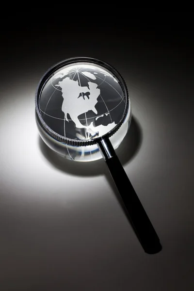 Globe and Magnifying Glass — Stock Photo, Image