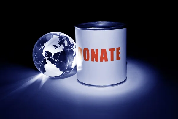 Globo e scatola delle donazioni — Foto Stock