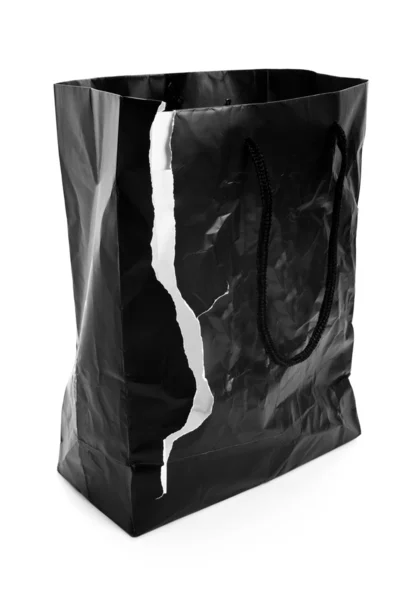 Zerrissene schwarze Einkaufstasche — Stockfoto