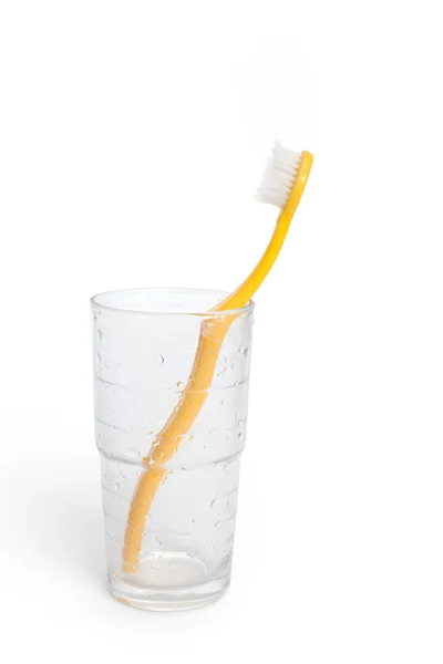 Tandenborstel en glas — Stockfoto