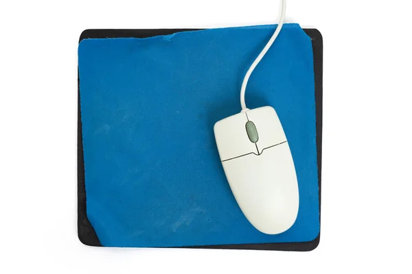 Myszy komputerowej i stare podkładki pod mysz — Zdjęcie stockowe