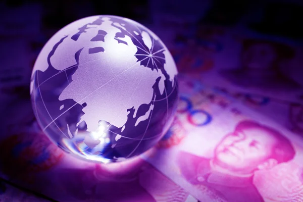 Globe en yuan — Stockfoto