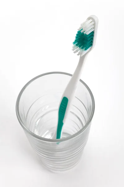 Escova de dentes e vidro — Fotografia de Stock