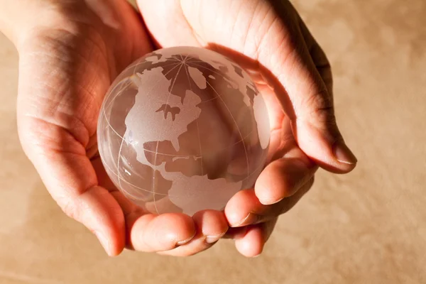 Hand holding a Globe — Stock Photo, Image