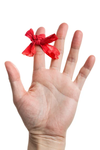 Üstünde parmak kırmızı yay — Stok fotoğraf
