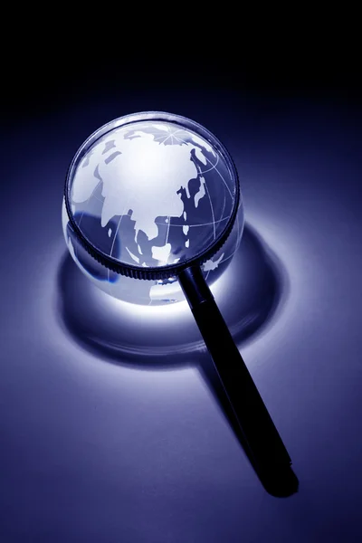stock image Globe and Magnifying Glass