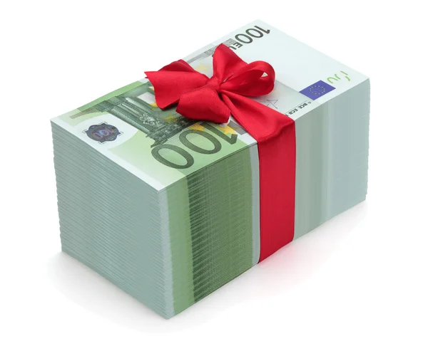Pile of one hundred euro banknotes with red ribbon and bow. — Stock Photo, Image
