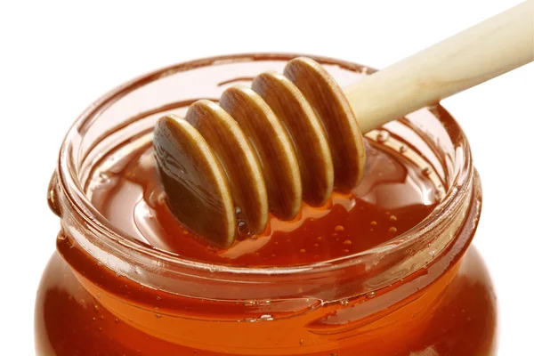 Olla de madera con tarro de miel . —  Fotos de Stock