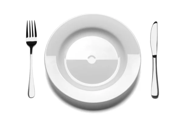 Assiette vide avec fourchette et couteau . — Photo