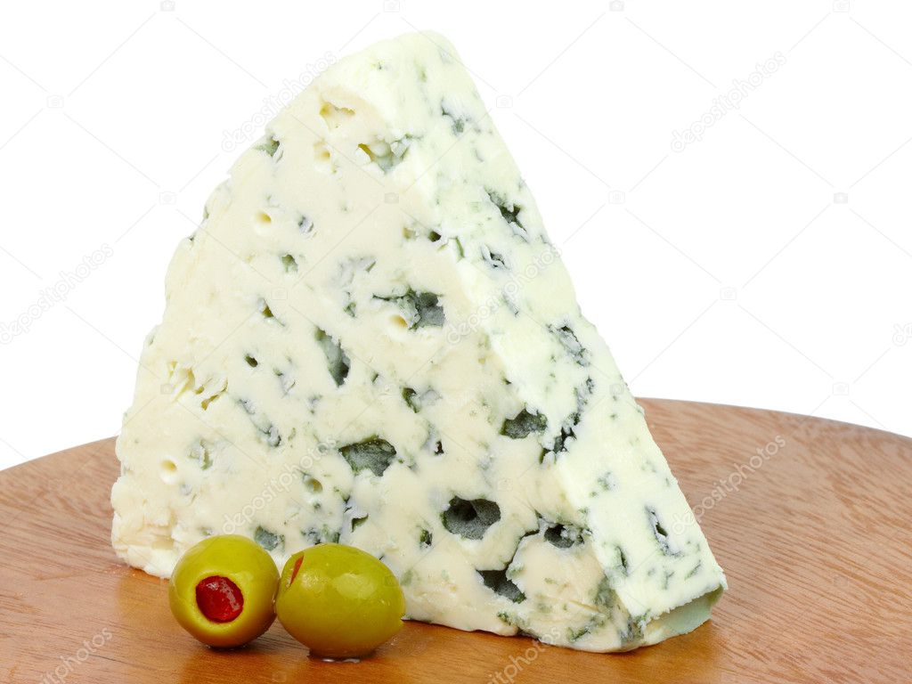 Slice of blue cheese with green olives.