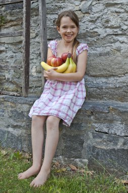 Girl is eating fruits clipart