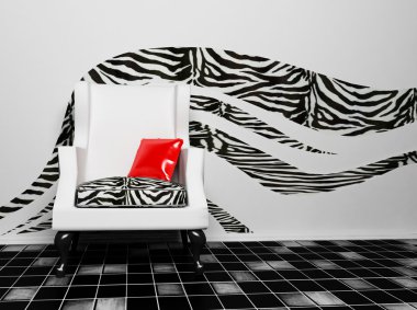kırmızı bir yastık ile blask ve beyaz bir koltuk