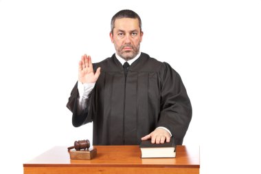 Serious male judge taking oath clipart