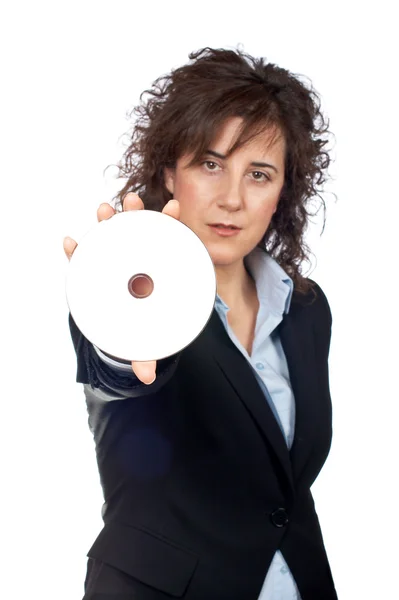 Mulher de negócios segurando um disco de DVD — Fotografia de Stock
