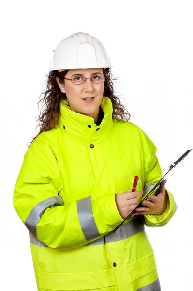 Female construction worker writing — Stock Photo, Image