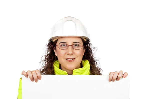 Kíváncsi női építőmunkás — Stock Fotó