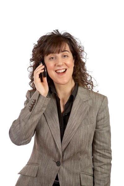 携帯電話で話しているビジネス女性の笑みを浮かべてください。 — ストック写真