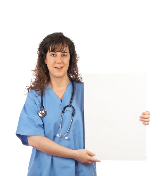 Medico donna che tiene il cartello bianco — Foto Stock
