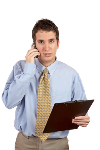 Homem de negócios sério conversando com telefone celular — Fotografia de Stock